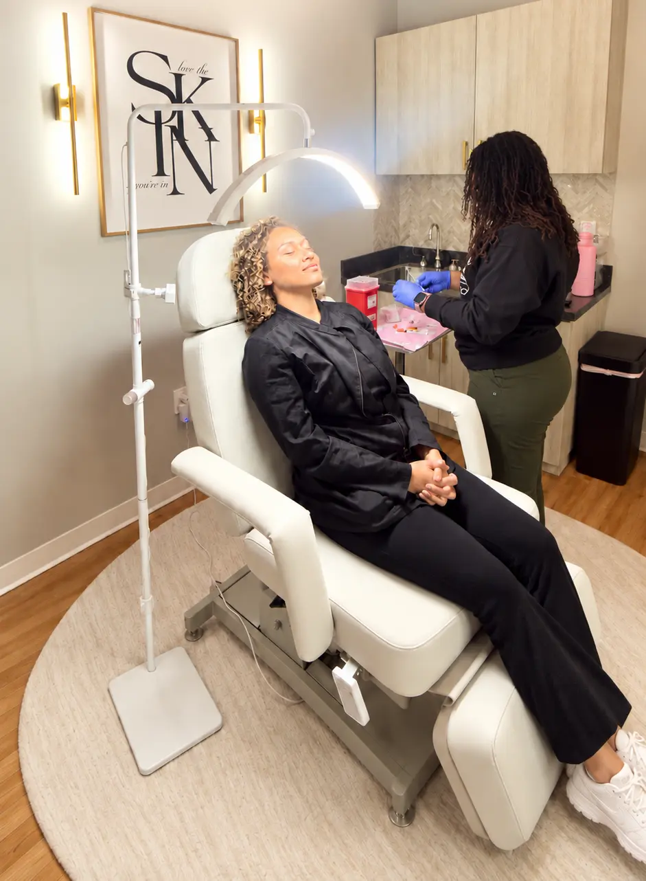 Client and provider in the aesthetics treatment room at LIVE Hydration Spa Cary