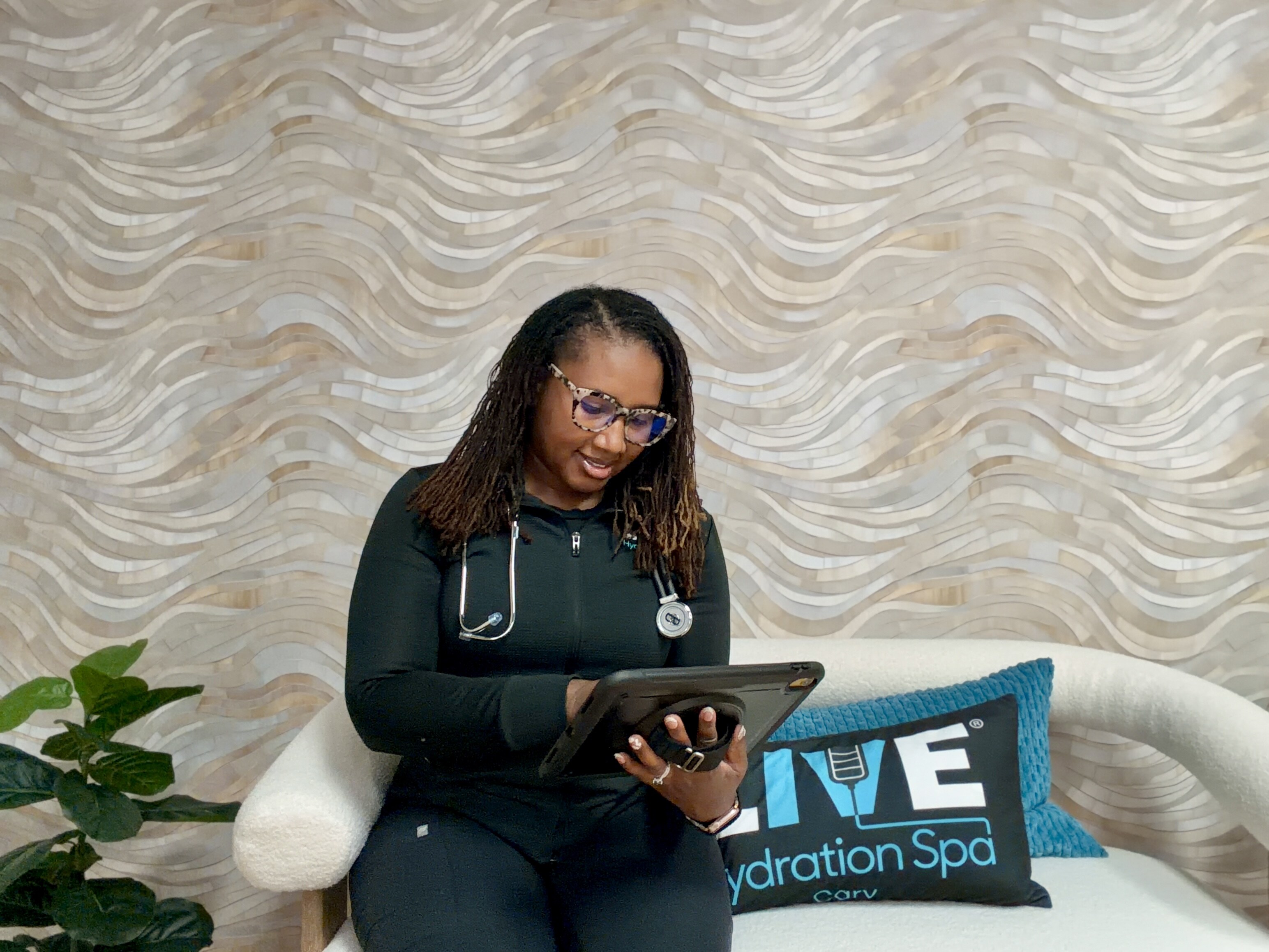 Live Hydration Spa Cary medical staff member reviewing a weight loss plan